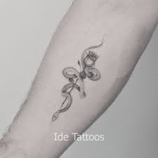 Snake Tattoos In 2021 Small Snake Tattoo Snake And Rose Tattoo Snake Tattoos