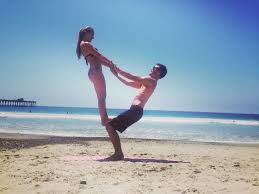 standing on human chair acro yoga poses yoga poses acro yoga