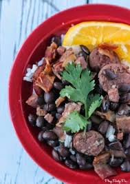 Black Beans And Rice With Sausage A Quick And Easy Feijoada Recipe Made With Successrice Smoked Pork Or Beef Sausage Sizzling Bacon Chicken Easy Feijoada Recipe Feijoada Recipe Food Recipes