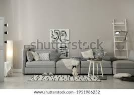 Read on for tips from an in a living room, you will want to make sure the rug is large enough to stretch underneath all the core the danger of styling a white room is the tendency to stay in line with the neutral color palette. Shutterstock Puzzlepix