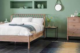 Unites traditional and transitional design elements for versatile styling. An Unusual Curve To The Spindle Headboard Gives This Bed Real Character Country House Interior Bed Design Wooden King Size Bed