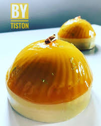 Dome Caraibes Creation By Tiston Composition Dacquoise Amande Mousse Mangue Passion Insert Cremeux Vanille Glacage Fruit Exotique Cerclage Chocolat Blanc C