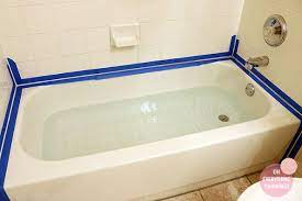 Caulking around your tub is a relatively simple process, but after the job is done, a full bathtub will tend to pull away from the wall or tiles due to the added weight. How To Re Caulk A Bathtub Tips Home Maintenance Bathroom Repair Bathtub Caulking