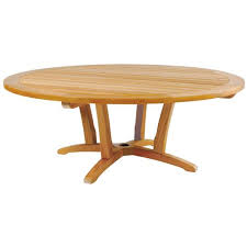 Internal hidden storage space upholstred in silk (various colors). Kingsley Bate Chat Coastal Beach Teak Wood Round Outdoor Coffee Table 51 W 60 W Kathy Kuo Home