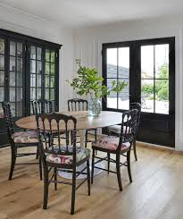 The combination of classic architectural elements and furniture silhouettes create a beautiful medley in combination with modern. Black French Patio Doors Fieldstone Windows And Doors