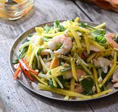 Combine shrimp, mango, cucumber, and mint in a bowl; Vietnamese Green Mango And Shrimp Salad Andrea Bayles