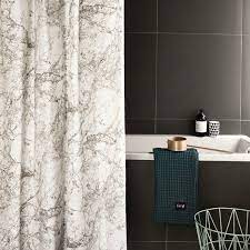 Elegant gray color suit for bathroom well, has lace decoration for the bottom part. Luxury Shower Curtains To Style A Modern Bathroom