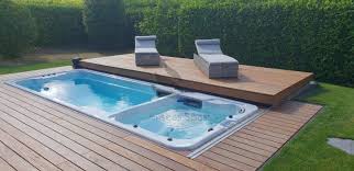 Ideal Combination Of Wellness Sports And Fun A Allseas Spas Duo Swimspa With Beautiful Rolldeck Would You Like One Massage Wel Tuin Ideeen Jacuzzi Tuin