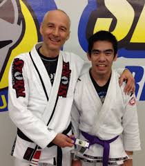 Promoted To Purple Belt By Renzo Gracie Bb Karel Pravec Purple Belt Renzo Gracie Coat