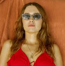 How Aimee Lou Wood's colourist achieved her 'copper sundowner' hair in  <i>The White Lotus</i>