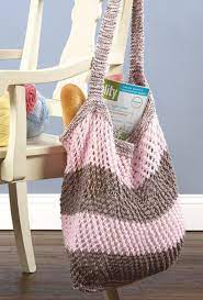Closure with strap with a magnetic button. Knitted Market Bag At Joann Com Knitted Bags Knitting Accessories Yarn Bag