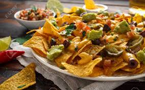 Maybe you would like to learn more about one of these? Mexican Nachos Tortilla Chips With Olives Jalapeno Guacamole Tomatoes Salsa Cheese Dipand Beer Stock Photo Picture And Royalty Free Image Image 119783650