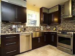 Instantly improve your kitchen space with fresh and chic cabinet ideas. Home Decor Modern Kitchen Design With Brown Wood Cabinet Dark Brown Kitchen Cabinets Brown Kitchen Cabinets Brown Kitchen Designs