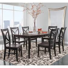 Generally the woods used for formal or traditional dining sets are mahogany and walnut. Cosmopolitan Coal Black Dining Room 7 Piece Set Butterfly Leaf Leg Table With 6 Salerno Side Chairs Bernie Phyl S Furniture By John Thomas Furniture