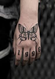 The vibrant orange and consider unconventional placement and exaggerated proportions to take your standard tattoo design to the next level. Top 4 Best Butterfly Hand Tattoo Design Ideas For Women Body Tattoo Art