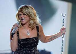 Miranda lambert has a large tattoo on her left forearm of two crossing guns with wings. Miranda Lambert Tattoos Meaning Miranda Lambert Tattoo Photos