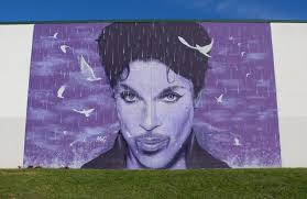 This is a picture of my wife becoming part of the mural when we were  leaving the art store.