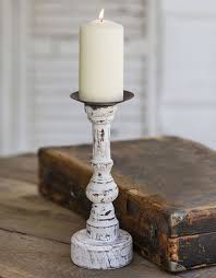 The surface has a fine finish that's silky smooth to the touch. Wood Pillar Candle Holder W Round Base Down South Inc