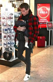 What does children in need mean to you? Eddie Redmayne Carries Baby Iris Through London Heathrow Daily Mail Online