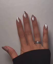 Looking for a nail salon that does Cats Eye nail designs and beautiful  Christmas designs like these