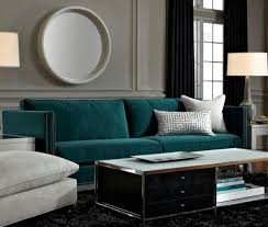 Deep Teal Sofa Is A Gem Against Grey Walls A Dark Rug And Midnight Curtains Teal Sofa Living Room Teal Living Rooms Living Room Grey