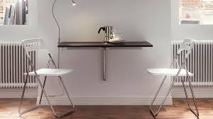 Yemek masası ve sandalyelerden oluşan yemek odası. Kucuk Ev Dekorasyonu Yemek Masasi Kullanimi