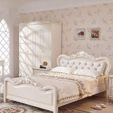 It includes a large, comfortable bed and a classic nightstand made of wood finished in white color. French Luxury Bed Ivory White Flannel Real Wood Bed European Style Solid Wood Bedroom Furniture Princess Bed Bt325 Real Wood Beds Wooden Bedsolid Wood Bedroom Furniture Aliexpress