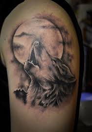 Wolf Tattoo Meaning And Symbolism Moon Tattoo Wolf Tattoo Meaning Compasstattoo Flowertatto In 2020 Wolf And Moon Tattoo Wolf Tattoo Sleeve Howling Wolf Tattoo