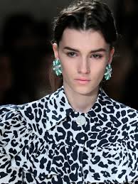 Zellweger hides face at Miu Miu in Paris; Kimye hit Vuitton