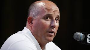 USC coach Clay Helton shifts focus from him to his players