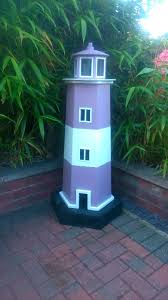 Lawn lighthouse made of treated 2 x 4's. Garden Pallet Lighthouse 1001 Pallets