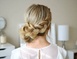 There's a ton of diversity when it comes to this cornrow hairstyle; Dutch Braid Holiday Updo Missy Sue