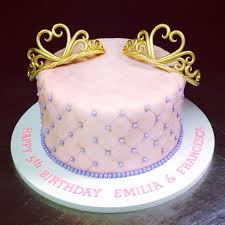 Sibling Birthday Cake For Twin Brother And Sister A Sweet Princess Cake For A Pair Of Twin Sisters Two Tiaras Hand Made Out Of Sugar An Twin Birthday Cakes Birthday Cakes For Teens 1st Birthday Cake For Girls