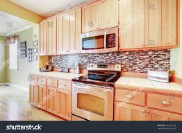 light wood cabinets multicolored