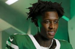 Dolphins Escape Van Buren To Remain First