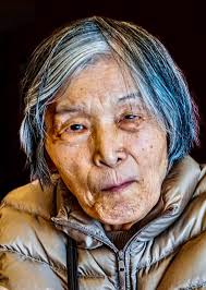 Older people smiling in photos, famous basketmaker