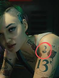 Judy has a "Ghost in the Shell" tattoo : r/cyberpunkgame
