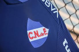 Club nacional de fútbol, uruguay athletic club ve montevideo fútbol club takımlarının birleşmesi sonucu 14 mayıs 1899'da uruguay'ın başkenti montevideo'da kurulmuş futbol kulübüdür.1 kulüp en çok futbol şubesiyle öne çıktıysa da, basketbol, futsal, tenis, bisiklet, voleybol ve satranç gibi. Club Nacional 2020 Umbro Blue Shirt 19 20 Kits Football Shirt Blog