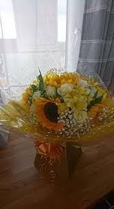 Corsage of david austen rosees, bud wax flower, berzelia and succulent. Flowers By Lorraine Facebook