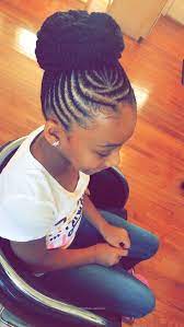 The hairstyle in the picture comprises several different elements of hairstyle: 12 Easy Winter Protective Natural Hairstyles For Kids Coils Glory Natural Hairstyles For Kids Cool Braid Hairstyles Cornrow Hairstyles