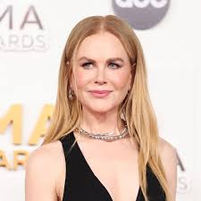 Nicole Kidman opts for chic waist-cinching coat dress for star-studded  outing