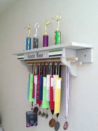 Sie haben noch sehr viele pokale aus kindertagen und würden diese gerne verkaufen? Gymnastics Trophy And Medal Shelf Google Search Trophy Shelf Trophies And Medals Trophy Display