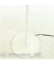 From the franklin iron works brand of lighting, the design features exquisite white cased glass buds atop a metal frame reminiscent of tree. Mid Century White Tulip Base Floor Lamp With Black Gold Metallic Shade