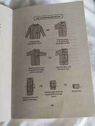 Fold the halved towel in half widthways. How To Do The Konmari Folding Method The Mummy Bubble