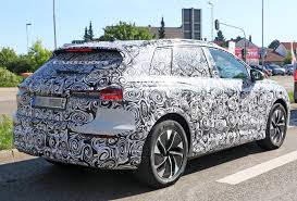 Nearly identical under the sheetmetal, the q4s will be positioned as audi's smallest and most affordable evs when they arrive in showrooms in a bid to bring electrification to the mainstream. Audi Q4 E Tron Spied With Production Body Closely Resembles The Concept Carscoops