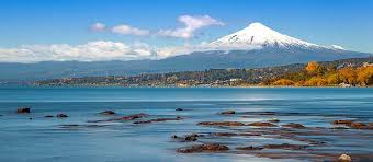 Calbuco and mt tronador are visible from the lakefront. Chile Lakes Volcanoes Summit Travel