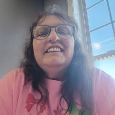 Lost cross charm in parking lot?