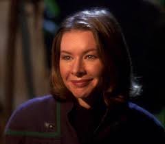 Happy heavenly birthday to Kellie Waymire. The actress played Layna in the  Voyager sixth season episode “Muse” but perhaps gained more recognition as  Crewman Cutler in multiple episodes of Enterprise. She died