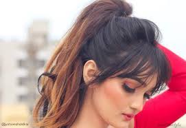 Black ponytail hairstyle with side bangs. 15 Cute Ponytails With Bangs To Copy For 2021