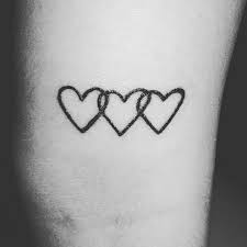 Triple Heart Tattoo On Inner Elbow Or Elbow Ditch Tattoo Hearttattoo Heart Heart Tattoo Designs Heart Tattoo Wrist Tiny Heart Tattoos